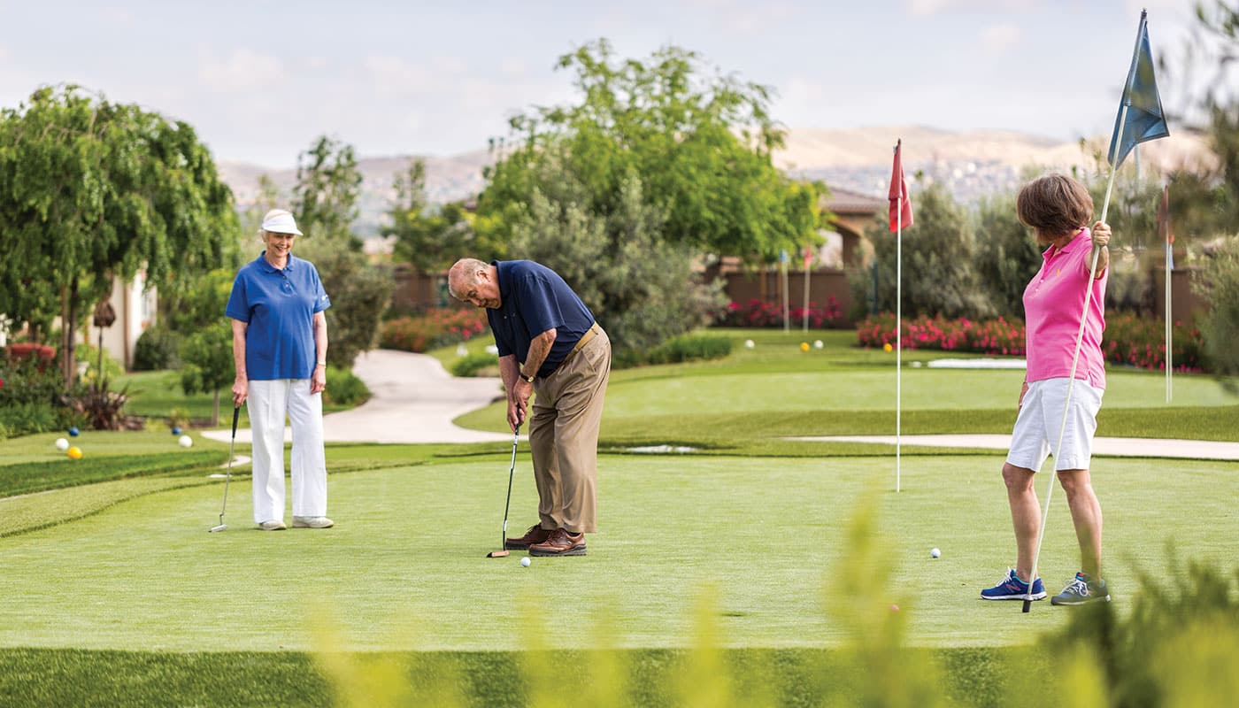 Resident putting on the green at Stoneridge Creek
