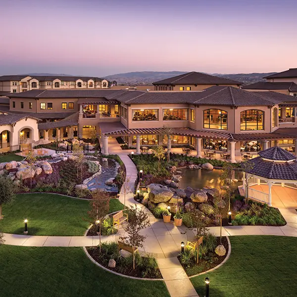 Arial view of Stoneridge Creek courtyard and buildings at sunset