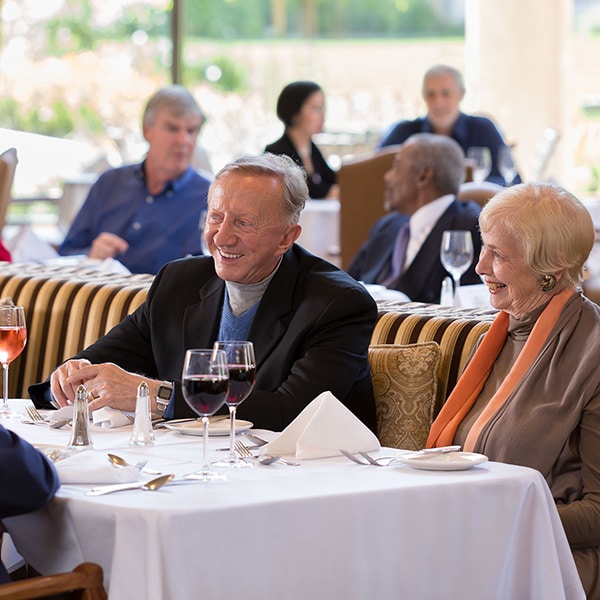 Elderly residents at a restaurant at Stoneridge Creek