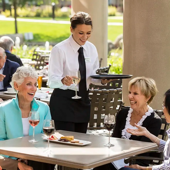 Elderly ladies sitting at a restaurant at Stoneridge Creek