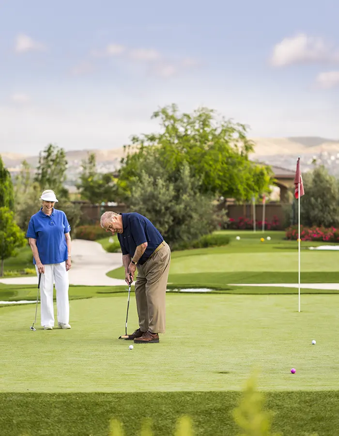 Two elderly men playing golf at Stoneridge Creek